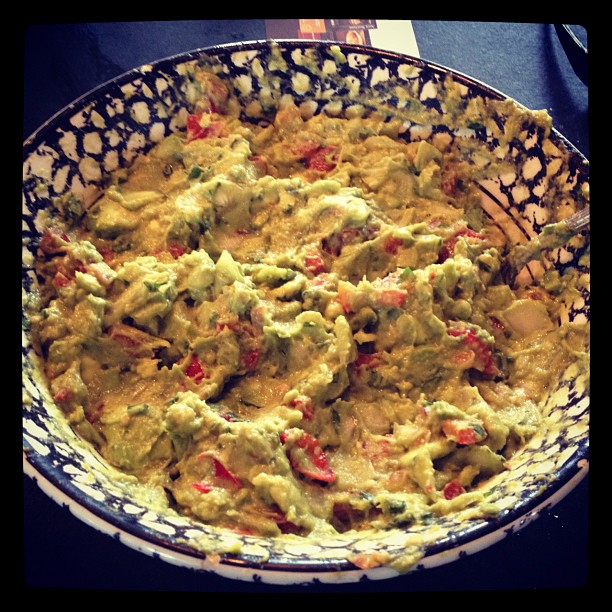 Are those tomatoes? Bell peppers? Habañeros? Your tongue will find out! #guacamole