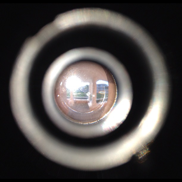 The sun is directly aligned with our room’s peephole.